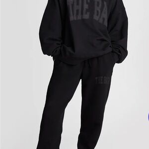 The Bar black sweatshirt in size XL. Fits more like a large from shrinkage.